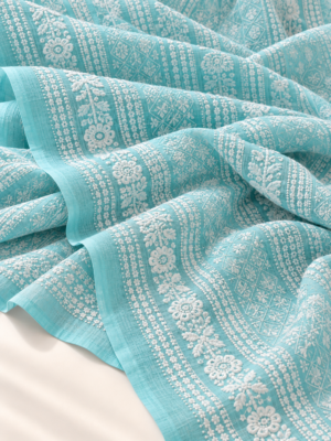 Aqua Blue Embroidered Georgette Fabric with White Floral Patterns