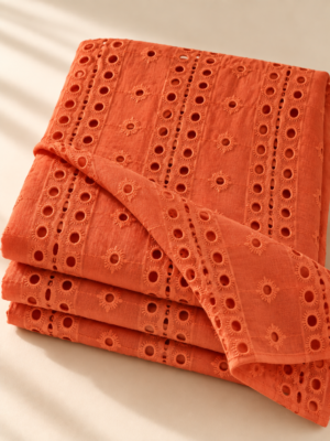 Warm Orange Eyelet Embroidered Georgette Fabric