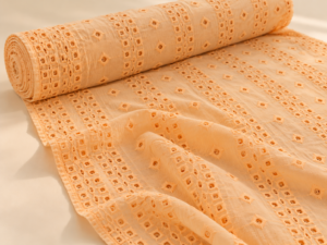 Sunlit Peach Eyelet Embroidered Georgette Fabric